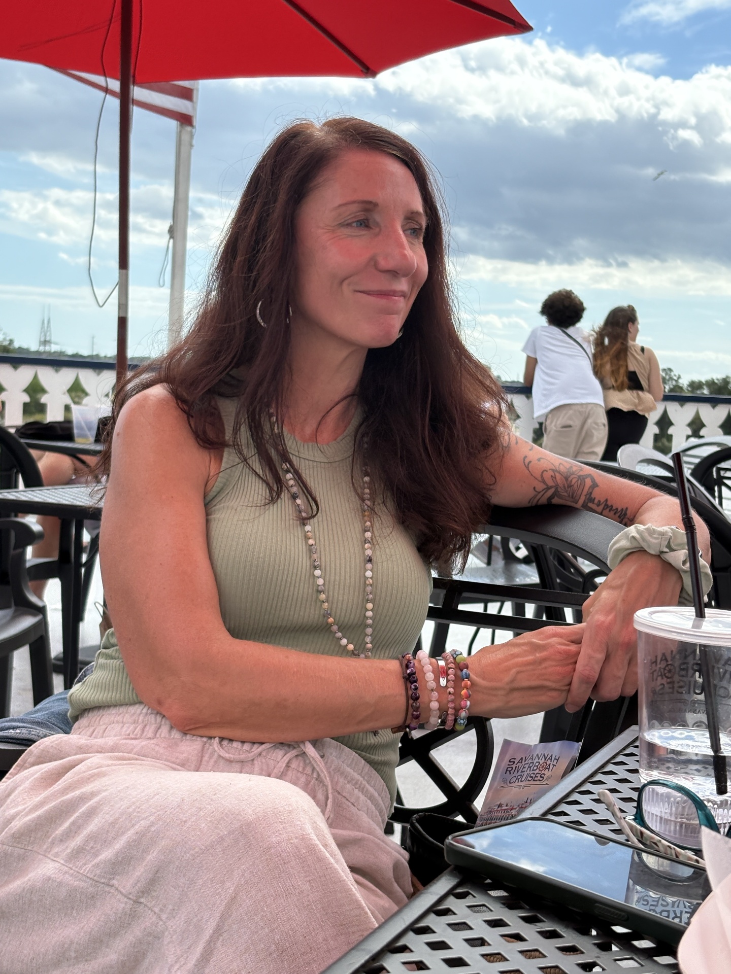 Cheryl, founder of Changing Lanes Wellness, smiling outdoors